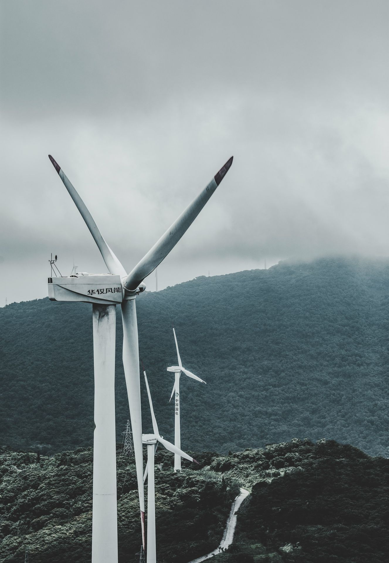 photo of wind mill during daytime